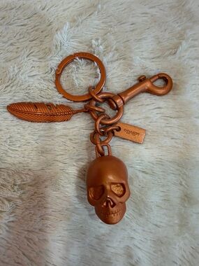 Coach Metallic Copper Feather & Charm Keychain